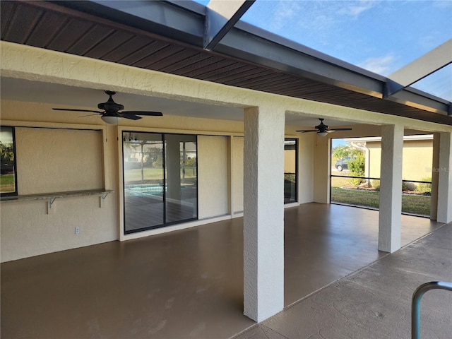 view of patio with ceiling fan