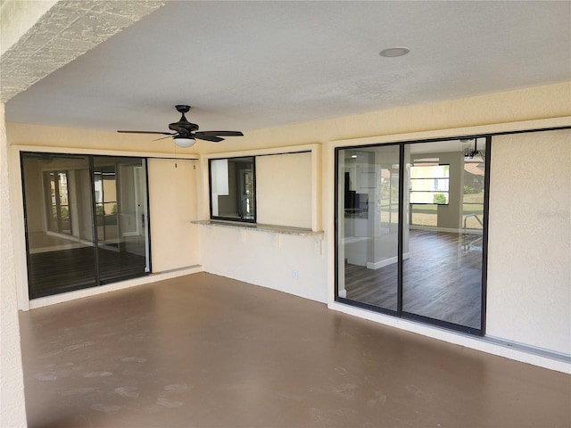 view of patio / terrace with ceiling fan