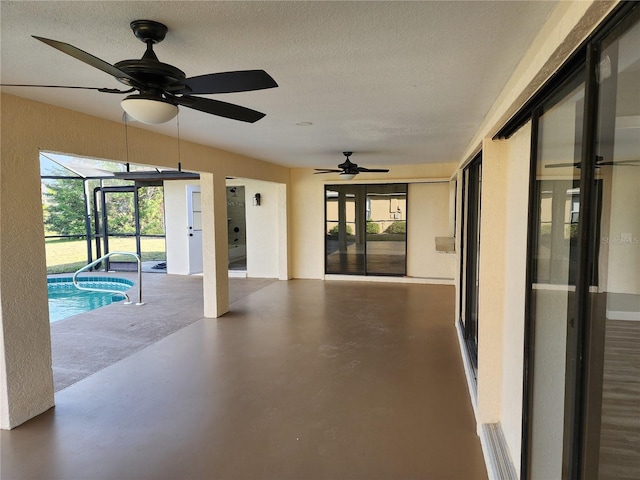 interior space featuring ceiling fan