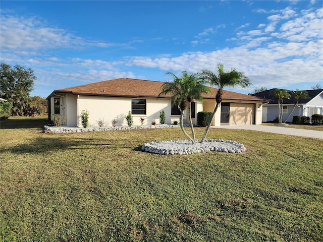 ranch-style house featuring a front lawn and a garage