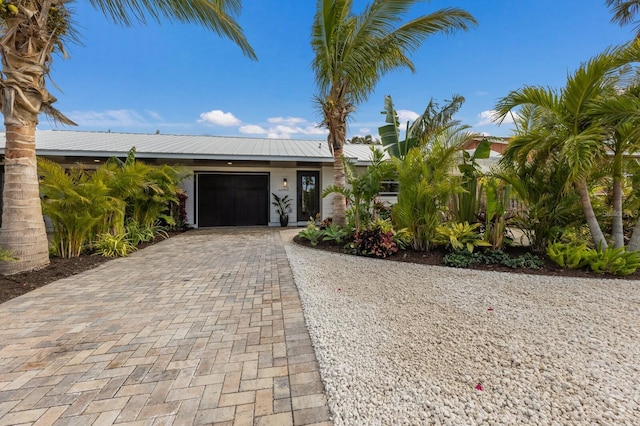 view of front of home with a garage