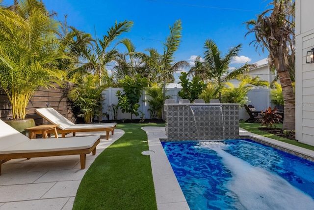 view of pool featuring a patio area