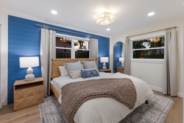 bedroom with light hardwood / wood-style flooring