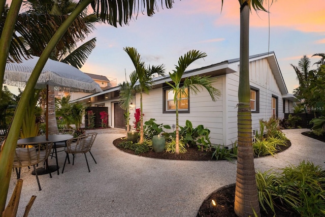 exterior space with a patio and a garage