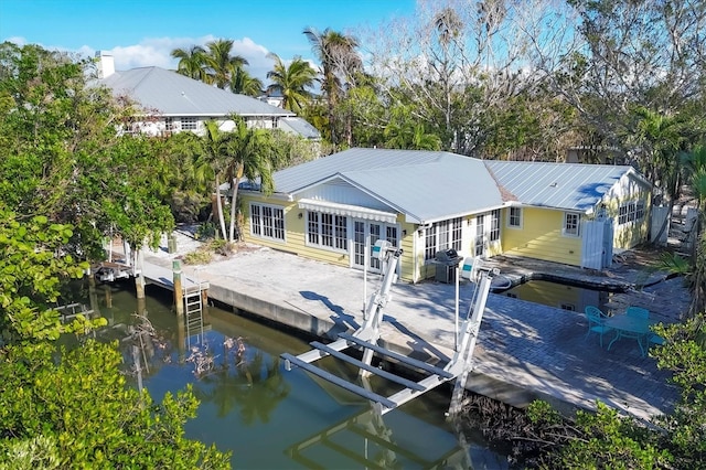 dock area featuring a water view