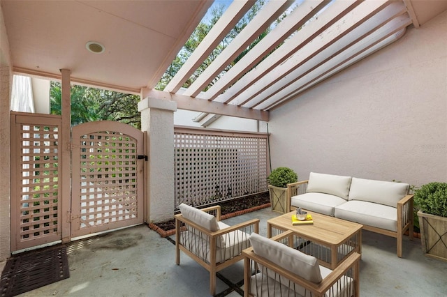 view of patio featuring an outdoor living space and a pergola