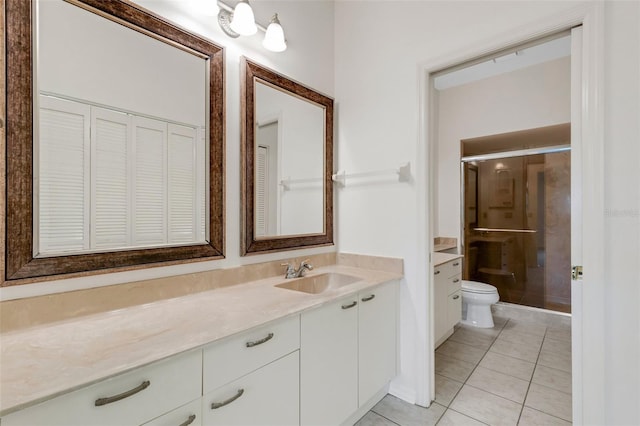 bathroom with walk in shower, tile patterned flooring, vanity, and toilet