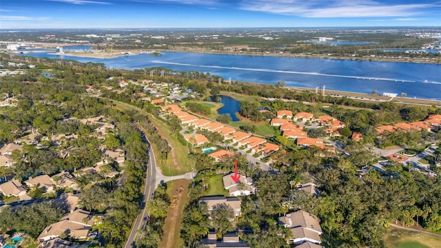 birds eye view of property featuring a water view