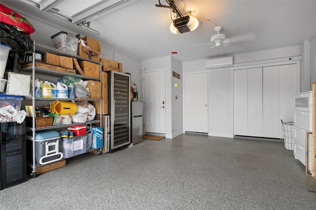 garage with a garage door opener, a wall mounted AC, and stainless steel fridge