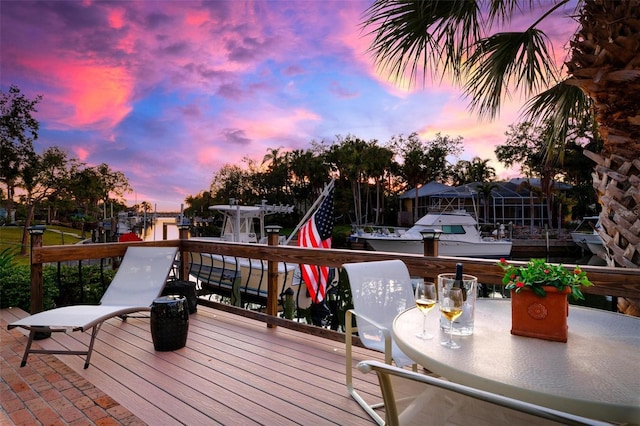 wooden terrace with a water view