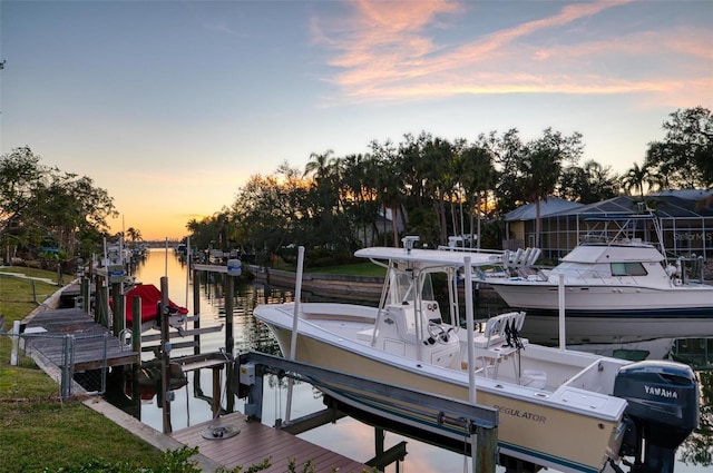 dock area featuring a water view