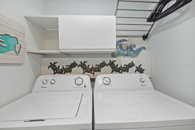 laundry room featuring washer and clothes dryer