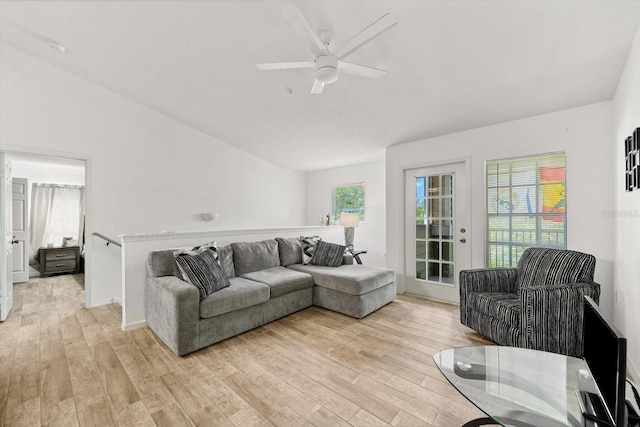 living room with light wood-type flooring and ceiling fan