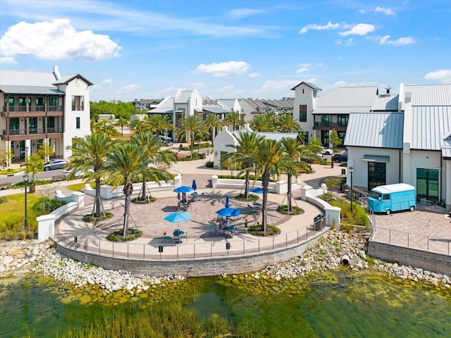 view of home's community with a water view