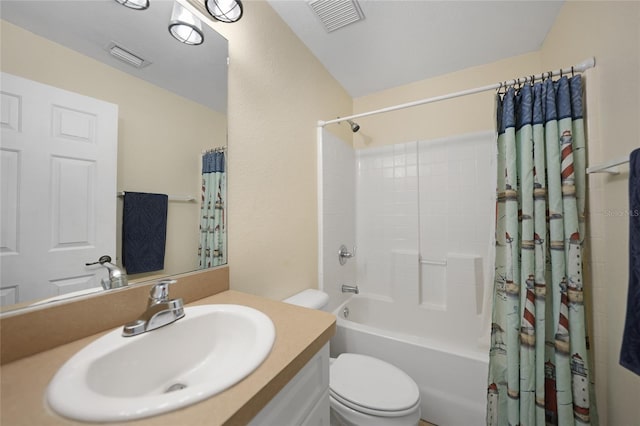 full bathroom with vanity, shower / bath combination with curtain, and toilet