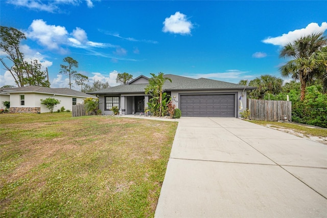 single story home with a front lawn and a garage