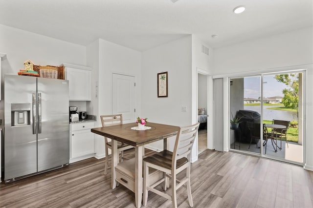 dining room featuring light hardwood / wood-style flooring