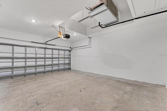 garage featuring a garage door opener