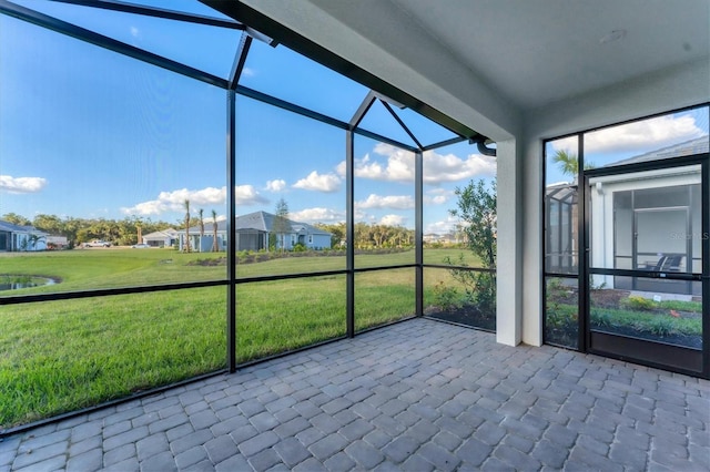 unfurnished sunroom featuring plenty of natural light