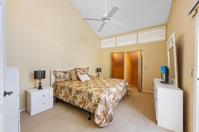 bedroom with ceiling fan, high vaulted ceiling, and light colored carpet