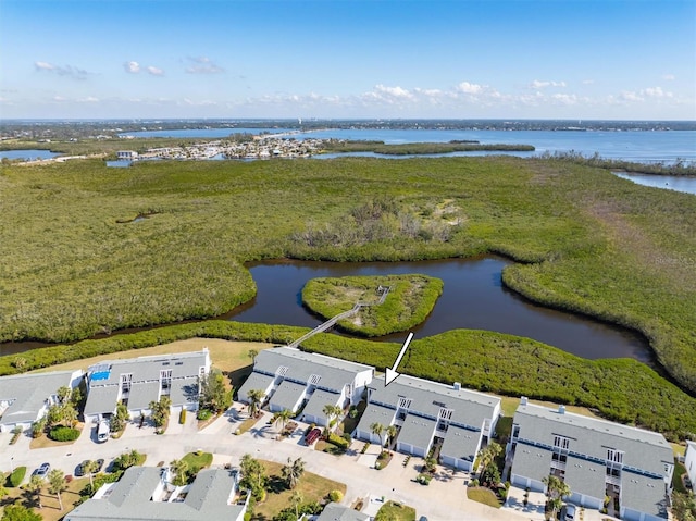 drone / aerial view with a water view