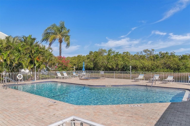 view of pool with a patio area