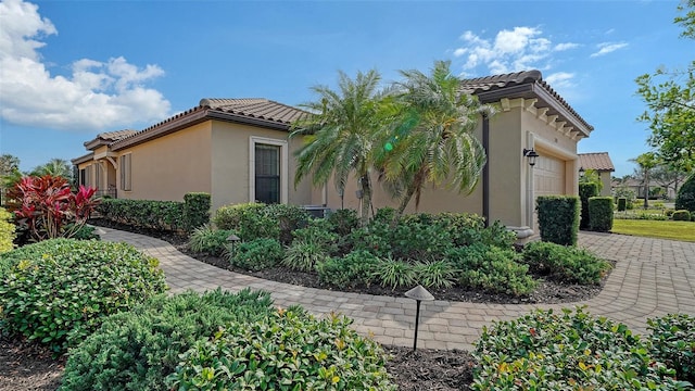 view of home's exterior featuring a garage