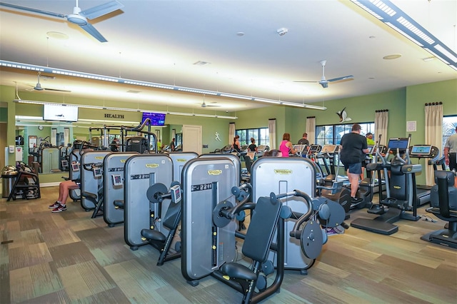 gym with carpet flooring and ceiling fan