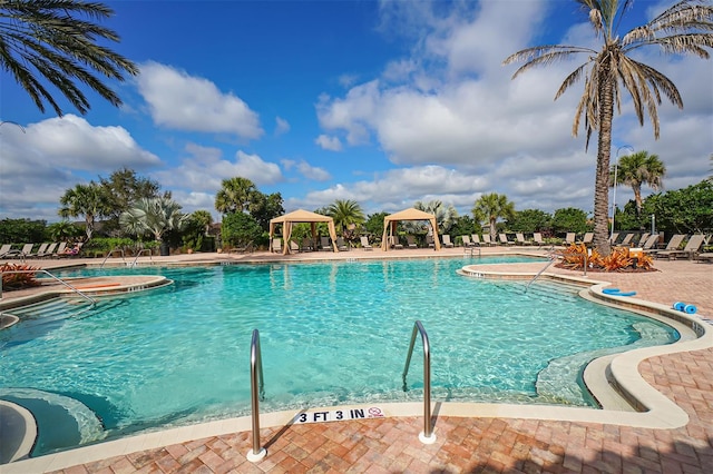 view of pool with a gazebo and a patio