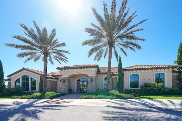 mediterranean / spanish house with french doors