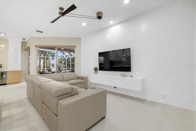 tiled living room featuring beverage cooler