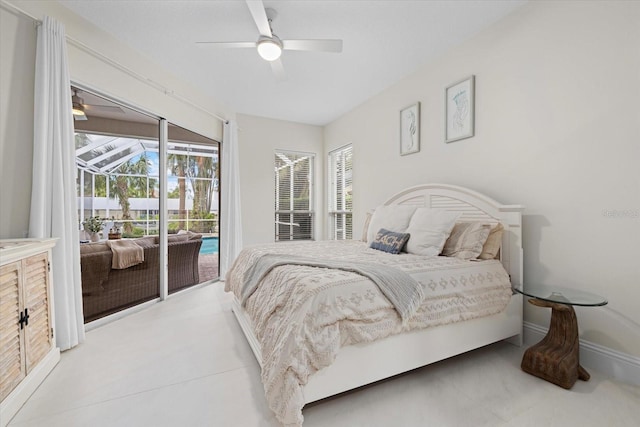 bedroom with access to outside and ceiling fan