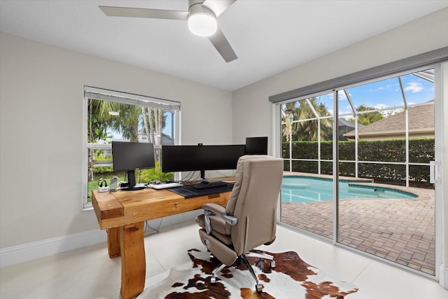 tiled home office with ceiling fan