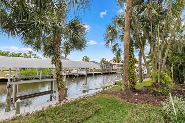 dock area featuring a water view