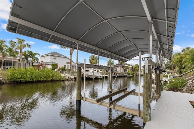 dock area with a water view