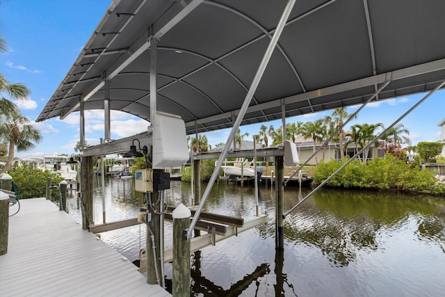 view of dock with a water view