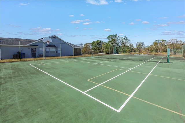 view of tennis court with basketball court