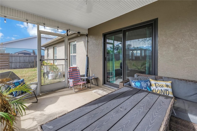 unfurnished sunroom featuring a healthy amount of sunlight