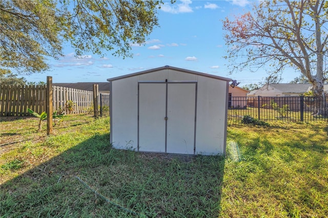 view of outdoor structure with a lawn