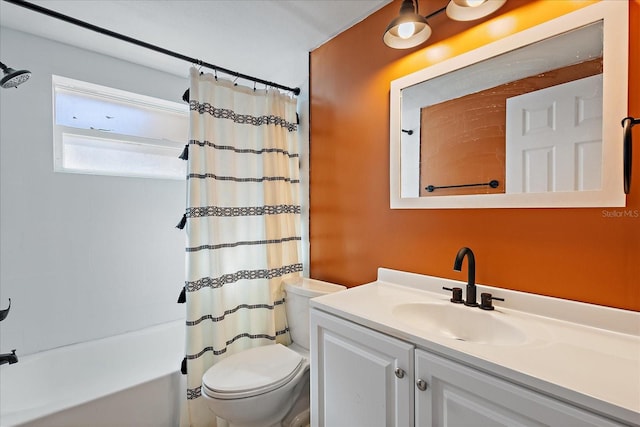 full bathroom featuring vanity, toilet, and shower / bath combo