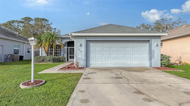 single story home with a front yard and a garage