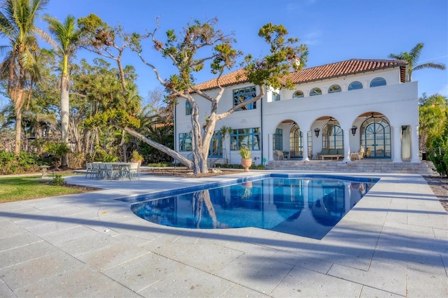 back of house featuring a patio area