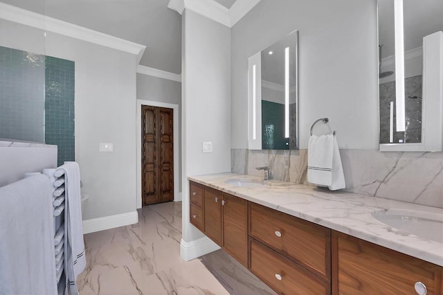 bathroom with vanity, crown molding, and backsplash