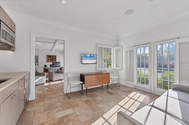 living room featuring beam ceiling, crown molding, and coffered ceiling