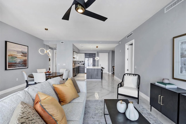 living room featuring ceiling fan