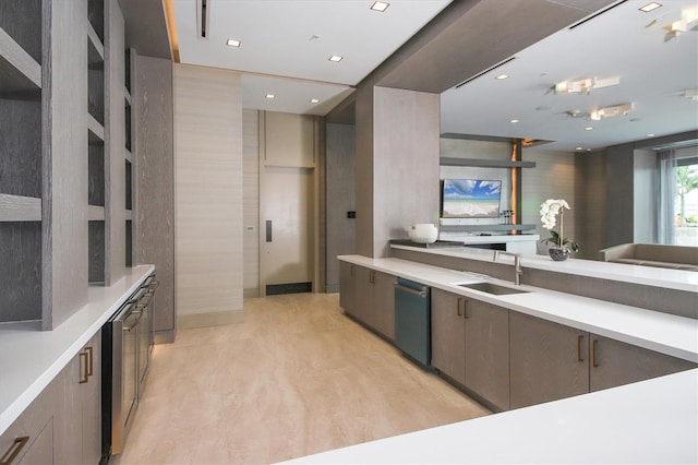 kitchen with light hardwood / wood-style flooring and sink