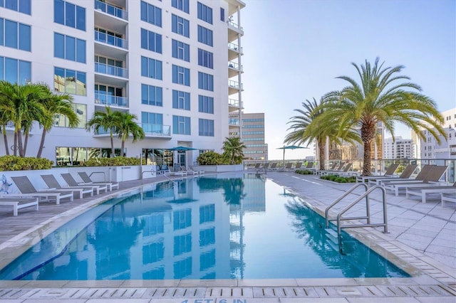 view of swimming pool featuring a patio