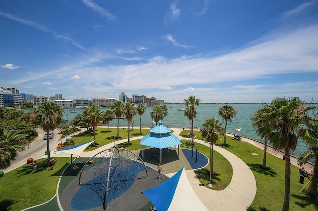 view of property's community with a gazebo and a water view