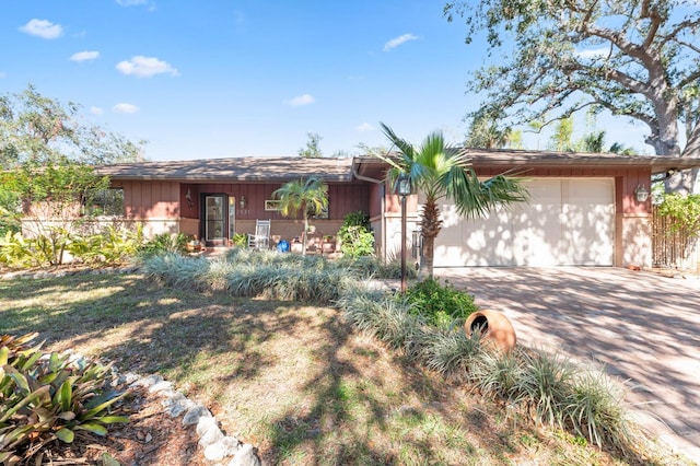 single story home with a garage