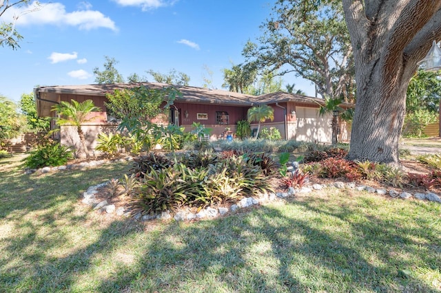 view of front of home with a front lawn